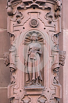 Sandstone sculpture on the outer facade of the rathaus roemer frankfurt am main germany photo