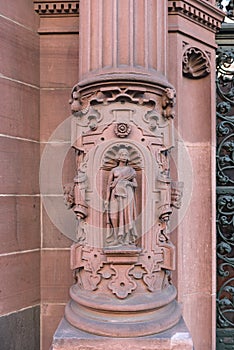 Sandstone sculpture on the outer facade of the rathaus roemer frankfurt am main germany photo