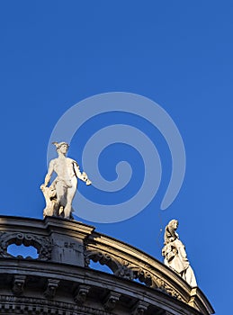 Sandstone statues at the roof of an old building at Max Josephs