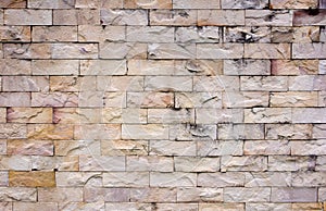 Sandstone brick wall texture background. Detail of sand stone wall texture. Colorful sand stone wall texture