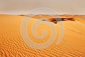 Sandstorm coming over the Arabian desert photo