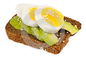 Sandwich with avocado and boiled egg isolated on white