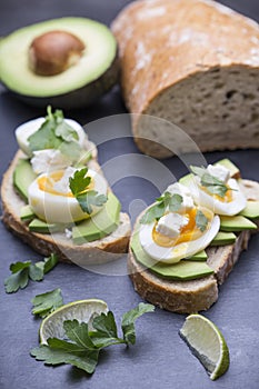 Avocado with egg and cheese photo