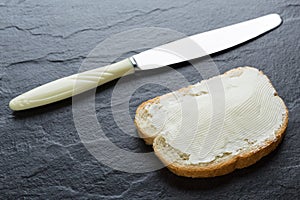 Sandwich, bread with butter and a knife