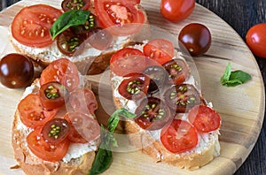 Sandwich, bread and butter, tomatoes and basil