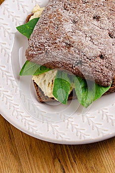 Sandwich bruschetta made from whole grain bread with cheese and spinach. Healthy snack, healthy food