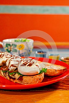 Sandwich of burrata cheese, grilled eggplant, tomato and artisan bread photo