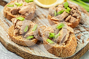 Sandwich with cod liver on rye bread. Healthy food concept. Food recipe background. Close up