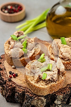 Sandwich with cod liver on rye bread. Healthy food concept. Food recipe background. Close up