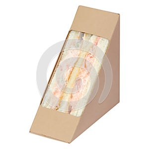 Sandwich with crab stick in brown cardboard