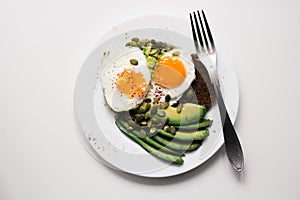 Sandwich with fresh vegetables, avocado, hard-boiled eggs and pumpkin seeds with olive oil and bread. healthy diet or