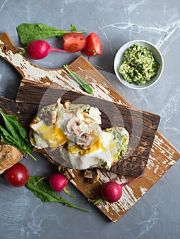 Sandwich with fried egg and avocado