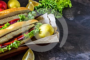 Sandwich with fried fish and vegetables. Balik ekmek - turkish f