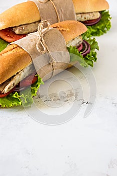 Sandwich with fried fish and vegetables. Balik ekmek - turkish f