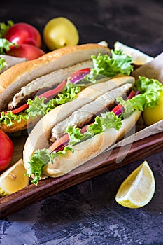 Sandwich with fried fish and vegetables. Balik ekmek - turkish f