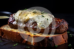 Fried meat on a piece of loaf with egg