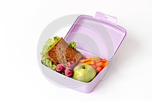 Sandwich and fruits in lunch box. Healthy snack meal