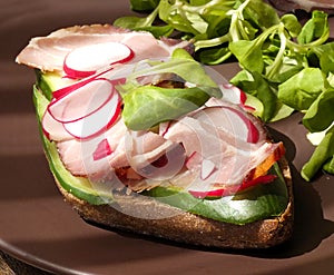 Sandwich with gammon ham, lettuce, radish and cucumber