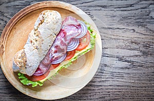 Sandwich with ham, cheese and fresh vegetables