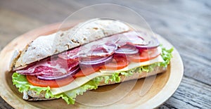 Sandwich with ham, cheese and fresh vegetables