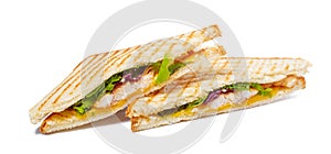 Sandwich with ham, cheese, tomatoes, lettuce, and toasted bread. Top view  on white background.