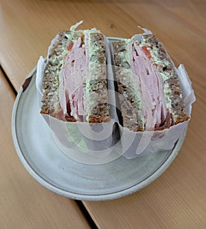 Sandwich with ham, lamb's lettuce, and fermented horseradish photo