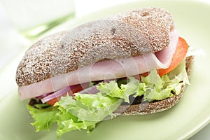 Sandwich with ham and vegetables