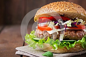 Sandwich hamburger with juicy burgers, cheese