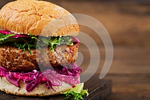 Sandwich hamburger with juicy burgers, red cabbage