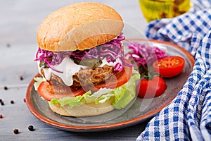 Sandwich hamburger with juicy burgers, tomato