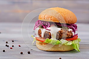 Sandwich hamburger with juicy burgers, tomato