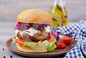 Sandwich hamburger with juicy burgers, tomato