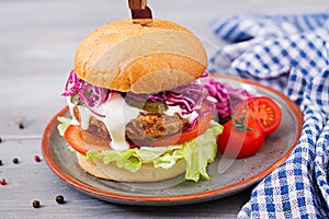 Sandwich hamburger with juicy burgers, tomato