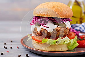 Sandwich hamburger with juicy burgers, tomato