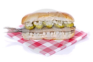 Sandwich with herring, onions and pickles