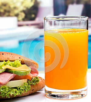 Sandwich And Juice Indicates Orange Drink And Cheddar