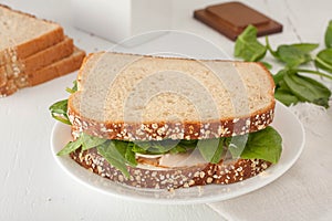 Sandwich with mayonaisse, turkey, cheese and fresh