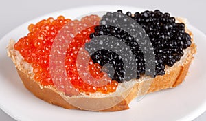 Sandwich with red and black caviar