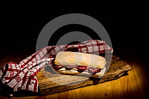 Italian Salami Sandwich  on wooden table