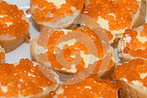 Sandwich with salted red raw caviar.