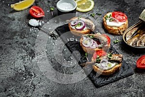 Sandwich with sprats. Sprat in oil, Danish cuisine. banner, menu recipe place for text, top view