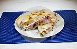 Sandwich With Tomato, Ham, Onion and Green Salad