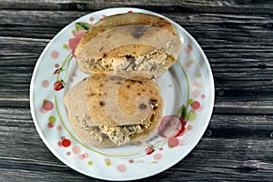 A sandwich of Traditional plain tahini halva or Halawa Tahiniya as basic tahini and sugar base inside a mini traditional Egyptian