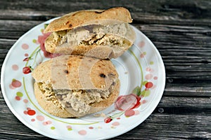 A sandwich of Traditional plain tahini halva or Halawa Tahiniya as basic tahini and sugar base inside a mini traditional Egyptian