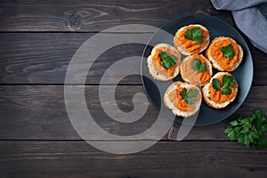 Sandwiches with bread zucchini caviar tomatoes onions. Homemade vegetarian food. Canned stewed vegetable. wooden background top