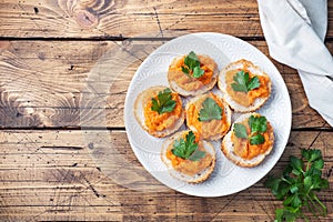 Sandwiches with bread zucchini caviar tomatoes onions. Homemade vegetarian food. Canned stewed vegetable. wooden background top