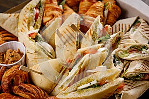 Sandwiches at catering snacks box.