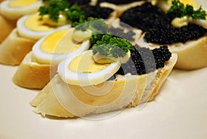 Sandwiches with egg and caviar