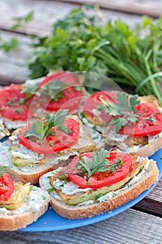 Sandwiches with grilled zucchini and fresh tomatoes