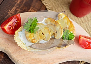 Sandwiches with mushrooms, turkey liver and tartar sauce on crispy baguette.